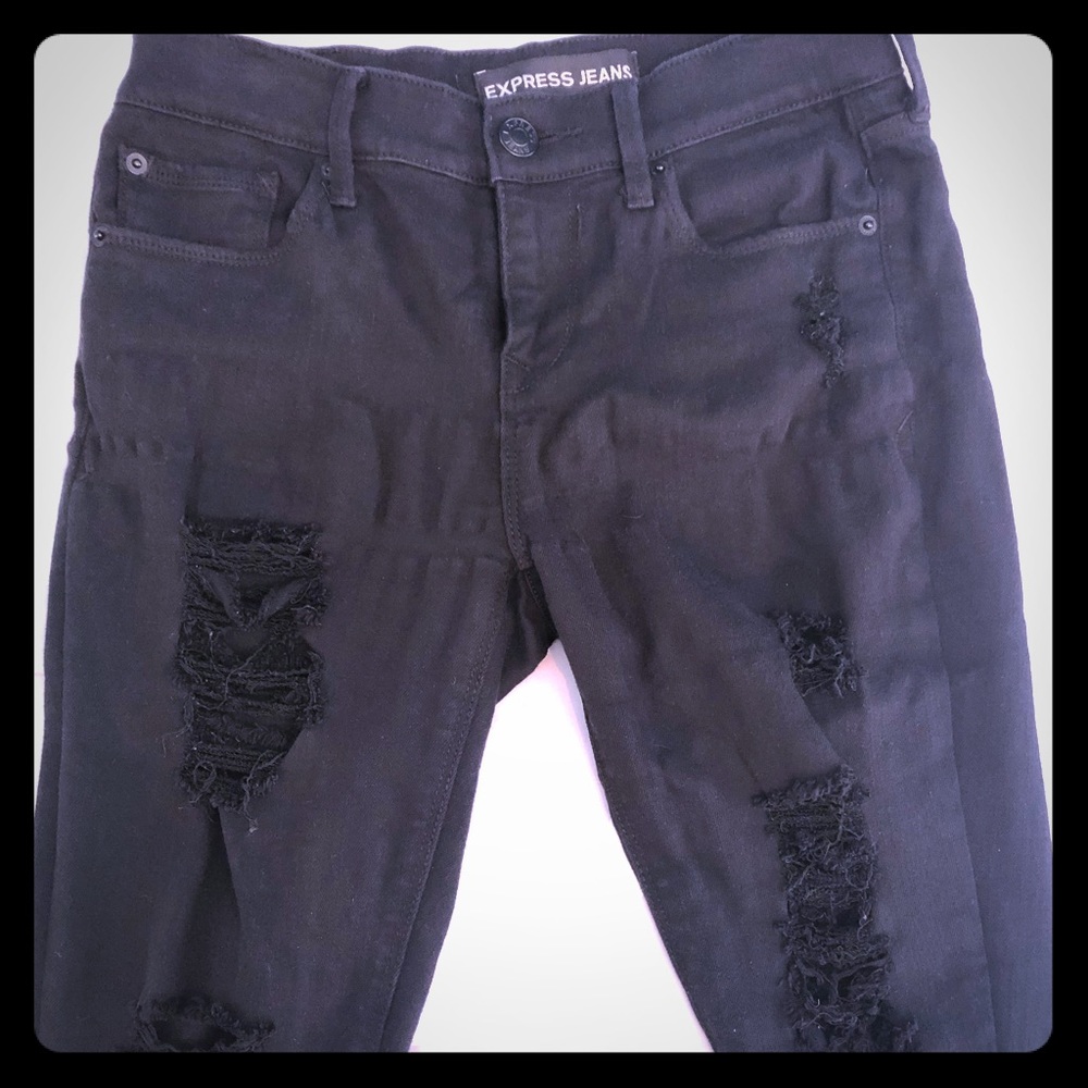Distressed Black skinny jeans